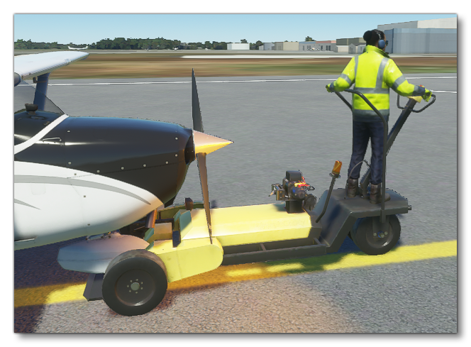 A Small Pushback Pushing A Cessna 172 SkyHawk